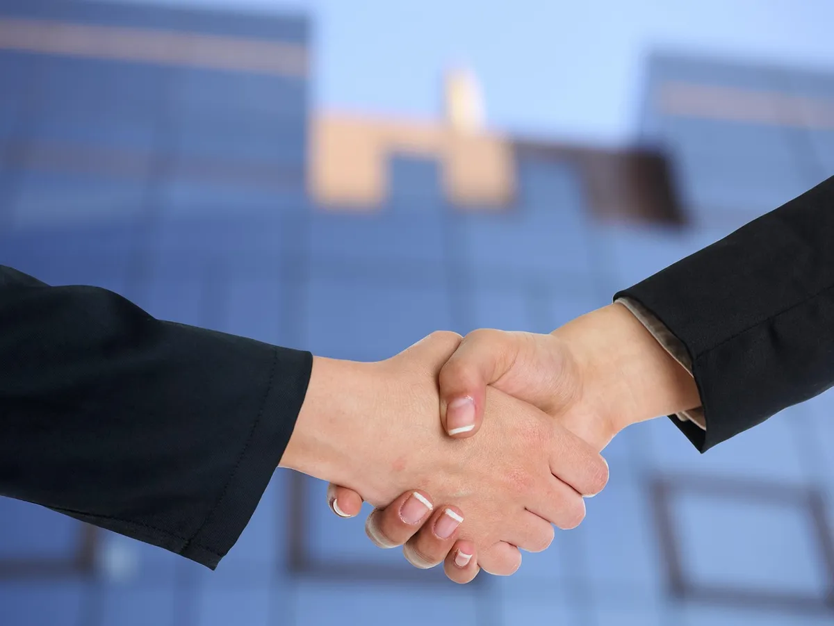 Business people shaking hands