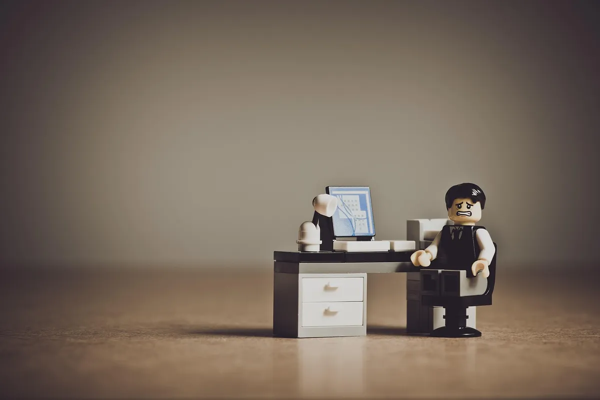Frustrated businessman looking at computer